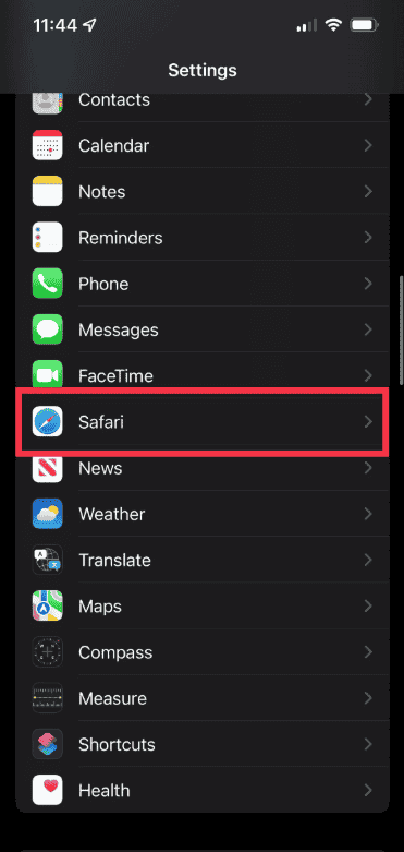 Screenshot of iPhone settings with a red box around the Safari option, part of a guide on how to clear cache on iPhone.